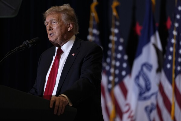 Former President Donald Trump speaks during a commit to caucus rally, Wednesday, Dec. 13, 2023, in Coralville, Iowa. (AP Photo/Charlie Neibergall)