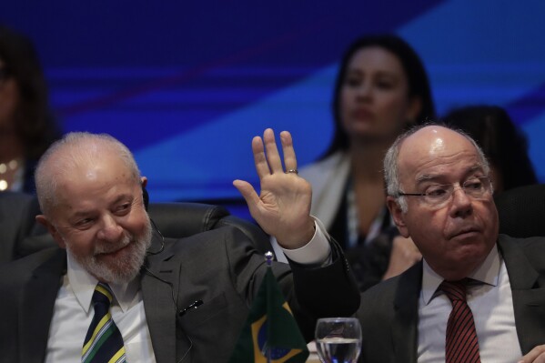 Brazil's President Luiz Inacio Lula da Silva waves during the opening event of the Global Alliance Against Hunger and Poverty meeting, on the sidelines of the G20 Ministerial Meetings in Rio de Janeiro, Wednesday, July 24, 2024. (AP Photo/Bruna Prado)