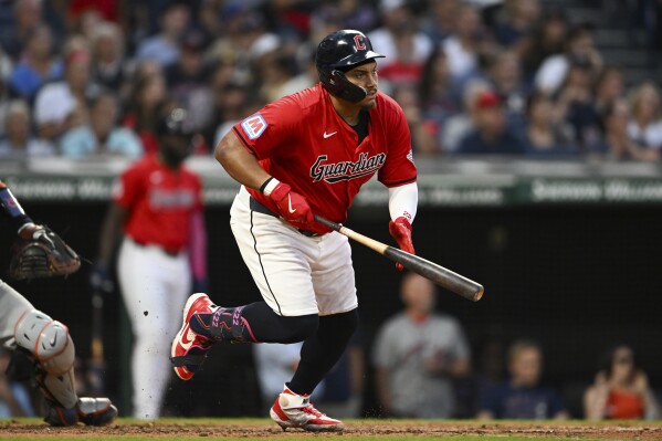 Cleveland Guardians' Josh Naylor runs out an RBI single during the eighth inning of a baseball game against the Detroit Tigers, Wednesday, July 24, 2024, in Cleveland. (AP Photo/Nick Cammett)