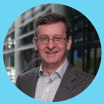 Circle photo of Claude Brown, director at Tech2, on a blue background.