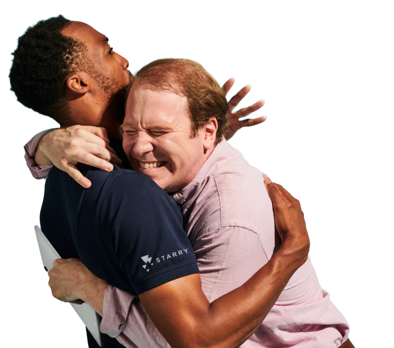 customer smiling and hugging a technician in appreciation