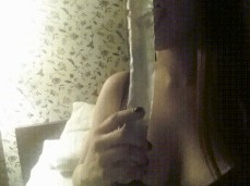 BustyCanadian girl deepthroats her dildo gif