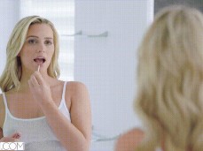 Mia Malkova puts on lipstick gif