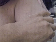 guy grabs tits, squeezes erect nipples - slaps it like real melons on fair gif