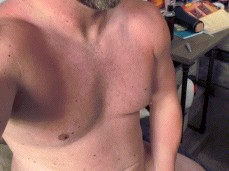 Bearded, beefy muscle hunk Megadongx jerks his big, thick, beautiful cock gif