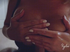 spreading cum on her boobs gif