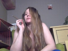 Smoking with messy hair, naked tits, long hair gif