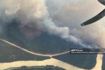 Image aérienne des flammes qui ravagent le parc national de Jasper, au Canada, le 23 juillet 2024. 