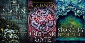 Image shows the three novel covers from N.K. Jemisin's The Broken Earth trilogy. The Fifth Season, The Obelisk Gate, and The Stone Sky.