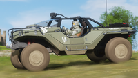 A UNSC Marine driving a M12S Warthog CST in The Halo Experience Showcase.