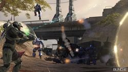 Promotional image for Halo 3 featuring John-117 fighting Covenant forces while traveling to Voi along Tsavo Highway on the campaign level Tsavo Highway.