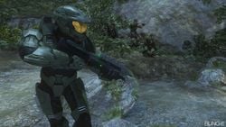 Promotional image for Halo 3 featuring John-117 with an MA5C assault rifle while accompanied by several UNSC Marines on the campaign level Sierra 117.