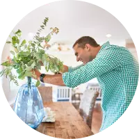 Vrbo host arranging flowers