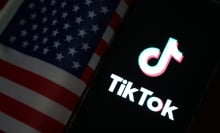 The TikTok logo next to an American flag.