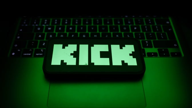 A laptop keyboard and Kick logo