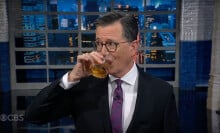 Stephen Colbert drinking bourbon on The Late Show with Stephen Colbert.