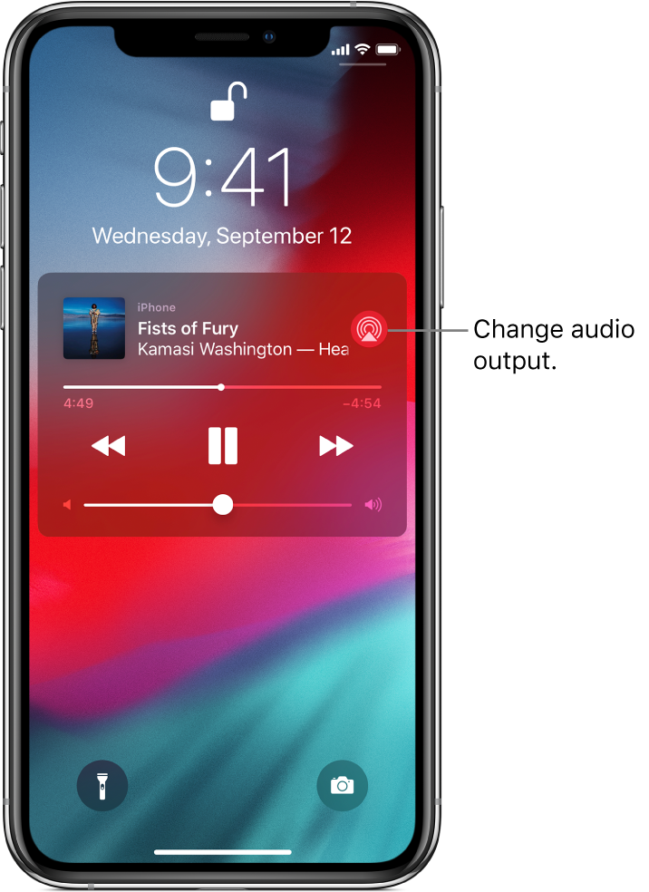 The Lock screen showing a song playing, audio playback controls, and the Playback Destination button.