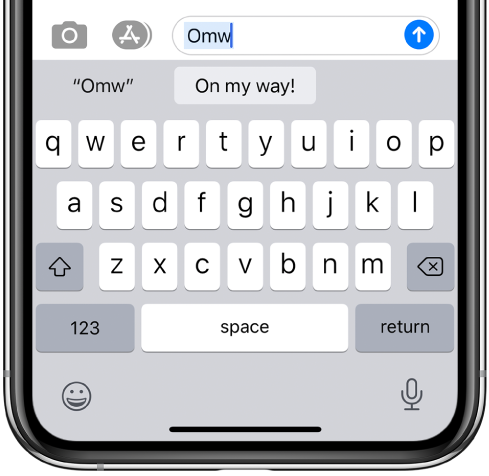 A message with the text shortcut OMW typed and “On my way!” suggested below as replacement text.