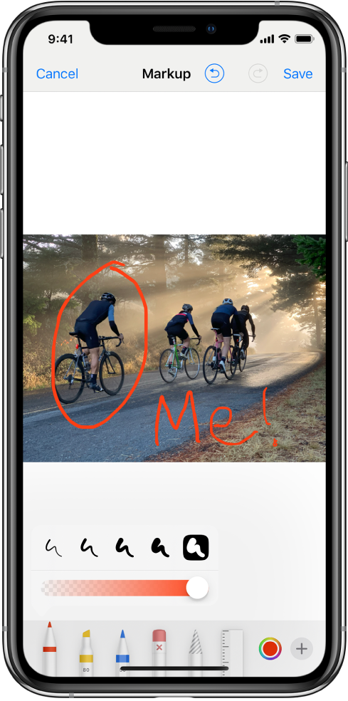 A Photo in the markup screen. The photo is in the center of the screen. Below the photo are the following markup tools: pen, marker, pencil, eraser, lasso, color picker and more options button. The Cancel button is on the top-left of the screen and Save button is on the top-right.