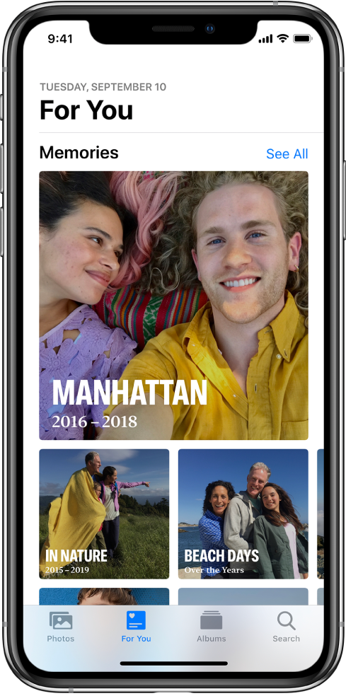The For You tab populated with a collection of different memories. Each memory has a cover photo, a title, and a subtitle. Underneath the For You header in the top right is a See All button, which shows you all your memories.