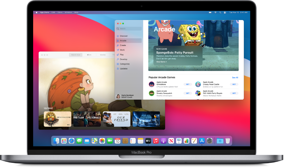 A Mac desktop with the Apple TV app showing The Watch Now screen and the App Store app showing Apple Arcade.