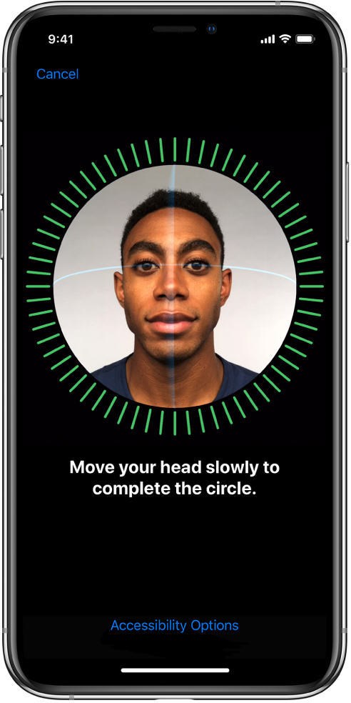 The Face ID recognition setup screen. A face is showing on the screen, enclosed in a circle. Text below that instructs you to move your head slowly to complete the circle.