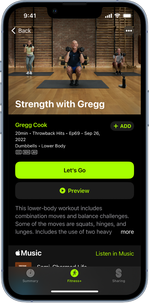 The Apple Fitness  screen showing a workout. An image of trainers performing a workout is at the top of the screen. The title of the workout and the name of the trainer leading the workout are in the center. The buttons to start and preview the workout are above the workout details. Below the start and preview buttons is a description of the workout. A song featured in the workout is toward the bottom of the screen.