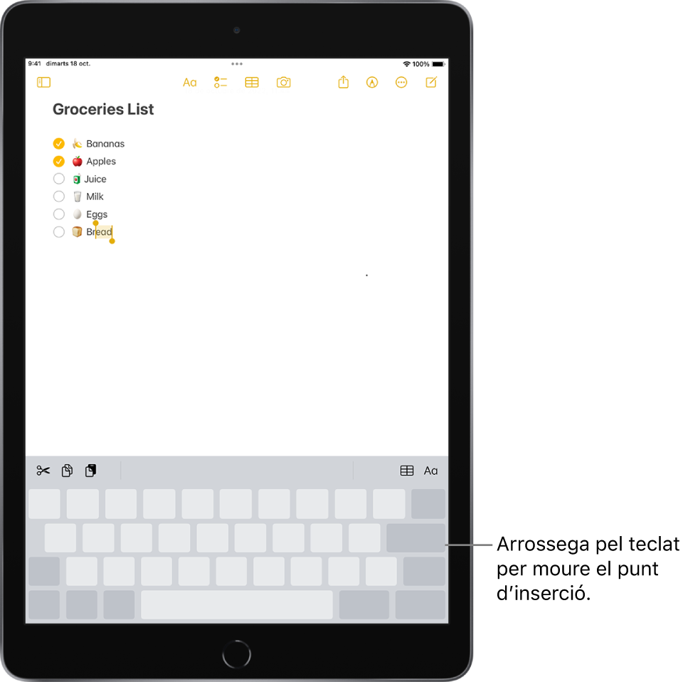 Edició d’una nota després de convertir el teclat en un trackpad. El teclat està atenuat per mostrar que ara funciona com a trackpad.