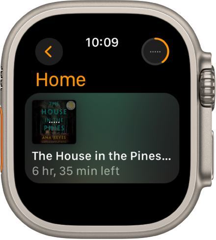 Ekrāns Home lietotnē Audiobooks. Augšējā labajā stūrī atrodas poga Now Playing. Pašreiz atskaņotā grāmata ir redzama vidū, bet atlikušais laiks ir redzams zem nosaukuma.