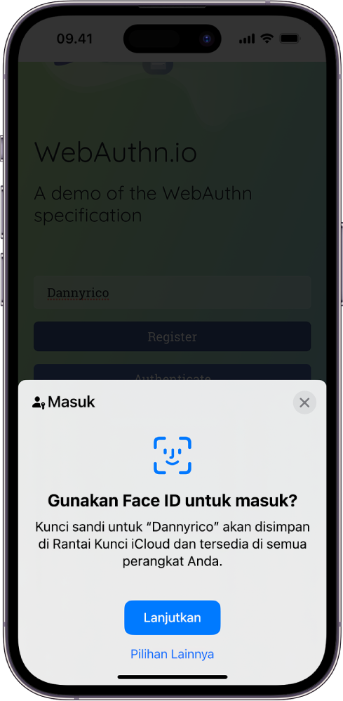 Setengah bawah layar iPhone memberikan pilihan untuk menggunakan kunci pass untuk masuk ke situs web. Layar memiliki tombol Lanjutkan untuk menyimpan kunci sandi, dan tombol Pilihan Lainnya.