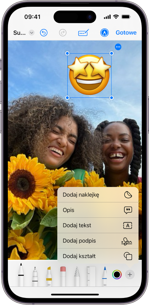 Załącznik PDF w aplikacji Poczta zawierający naklejkę z emoji. Poniżej strony widoczne są narzędzia oznaczania.