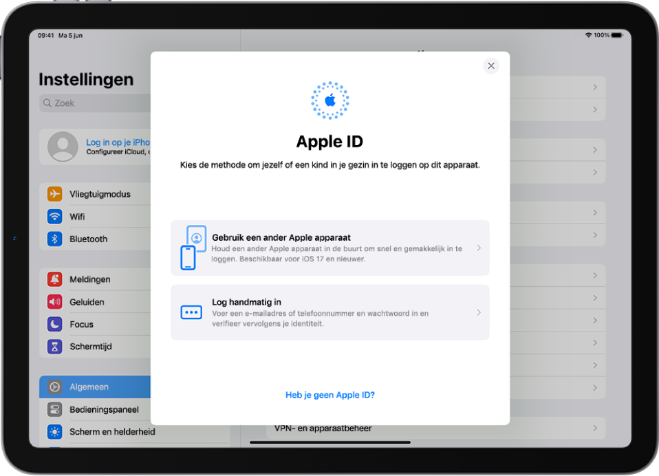 Het Instellingen-scherm met het Apple ID-inlogdialoogvenster in het midden van het scherm.