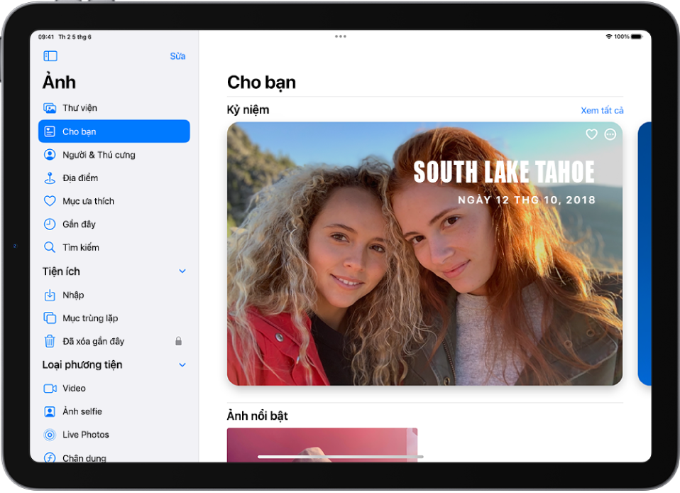 Cho bạn được chọn trong thanh bên của ứng dụng Ảnh. Phần còn lại của màn hình hiển thị kỷ niệm và Ảnh nổi bật.