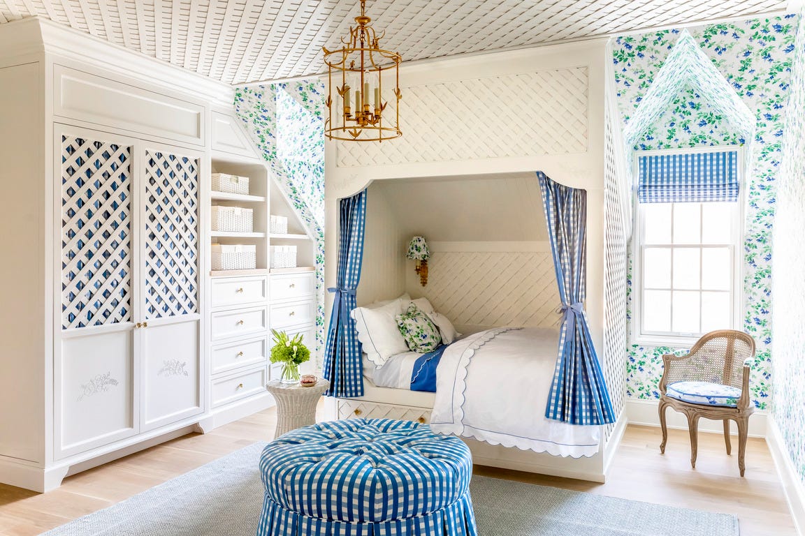 cara fox chose a sweet floral schumacher wallpaper and trelliswork to make this bed between the dormers feel like a secret garden