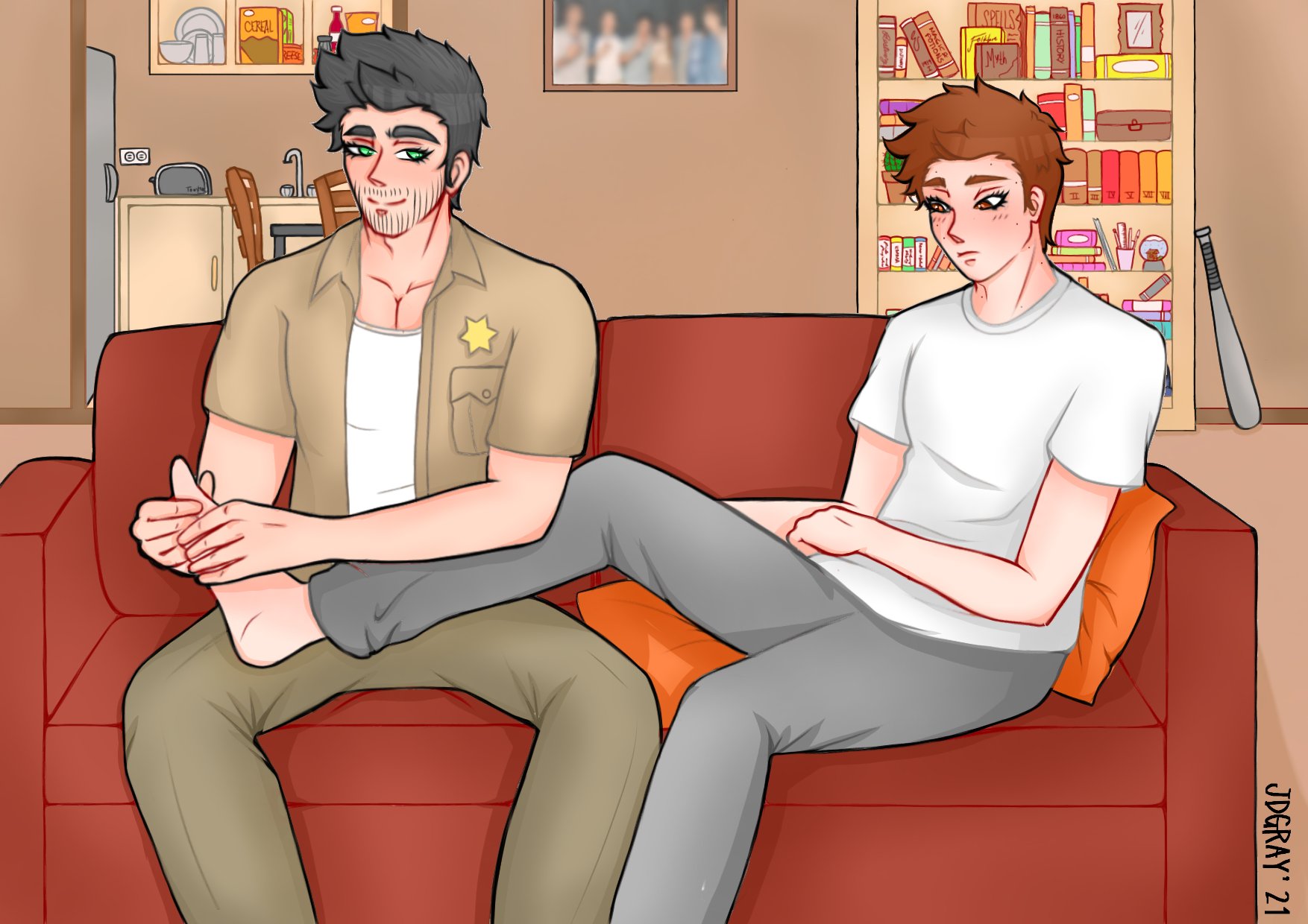 derek and stiles on a couch. derek has stiles's leg on his lap, checking his ankle