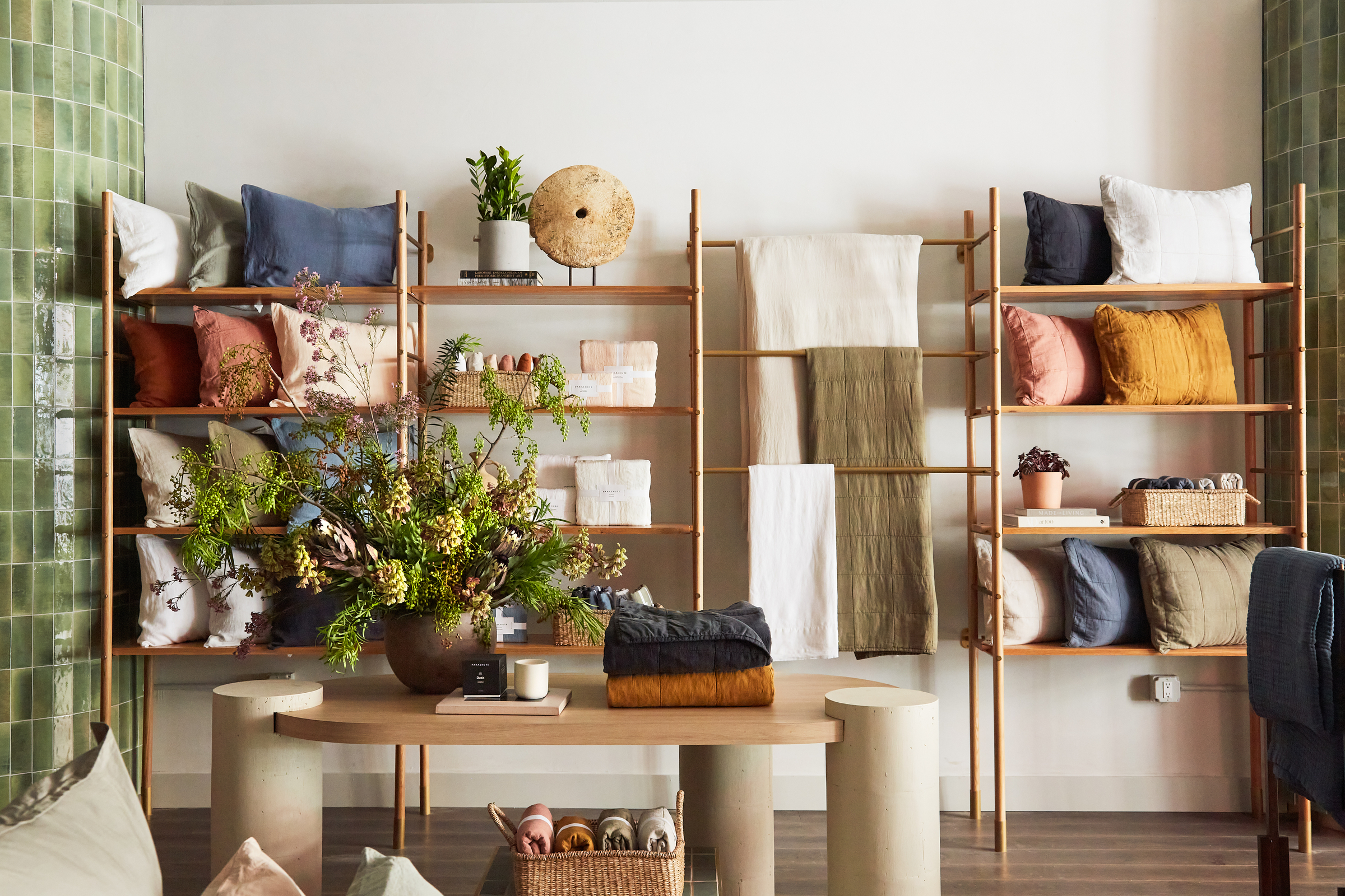 A wall of Parachute products in various colors and textures