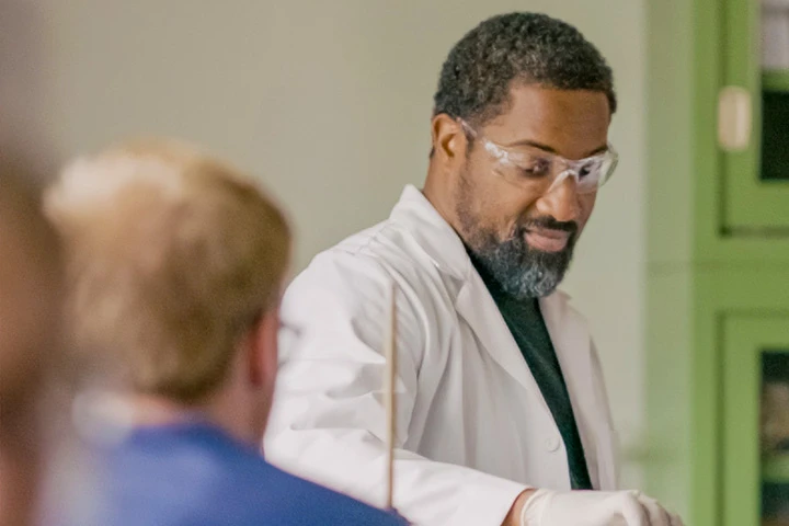 Photo of a professor in a lab