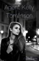 Agent Kelly Tomlinson by maddielizabetth