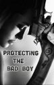 Protecting the bad boy  by toxic_girl2002