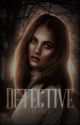 detective by streetlights-