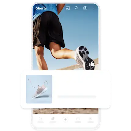 Приклад оголошення для створення попиту на мобільному пристрої, у якому показано кросівки в накладанні на коротке відео YouTube Shorts.