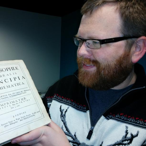 Picture of Logan with Principia Mathematica 1st ed.