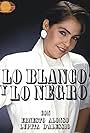 Lupita D'Alessio in Lo blanco y lo negro (1989)