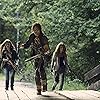 Norman Reedus, Eleanor Matsuura, and Nadia Hilker in The Walking Dead (2010)