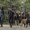 Norman Reedus, Danai Gurira, Tom Payne, Ross Marquand, Josh McDermitt, and Seven in The Walking Dead (2010)