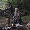 Norman Reedus and Melissa McBride in The Walking Dead (2010)