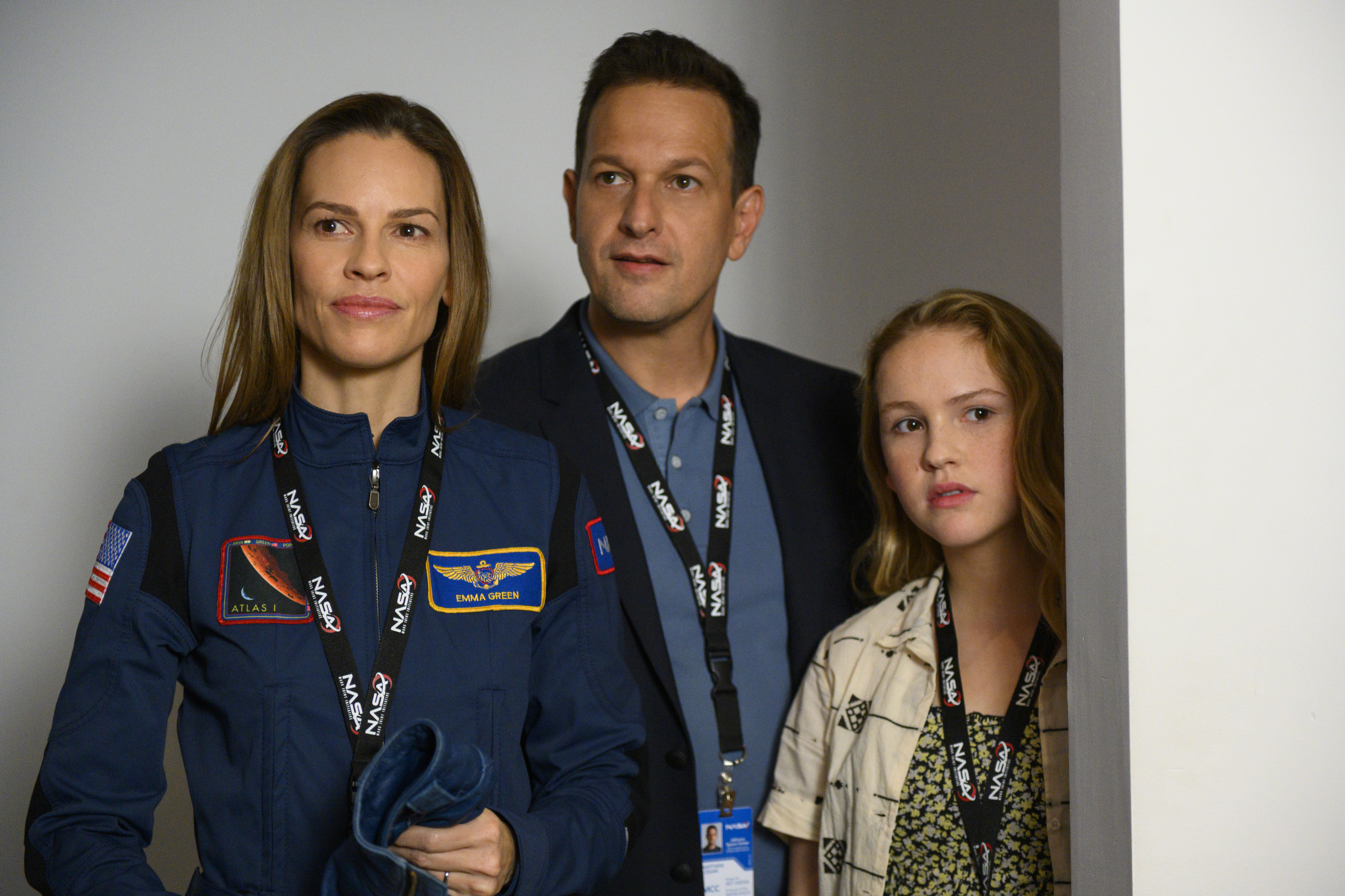 Josh Charles, Hilary Swank, and Talitha Eliana Bateman in Away (2020)