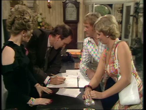 John Cleese, Trevor Adams, Prunella Scales, and April Walker in Fawlty Towers (1975)