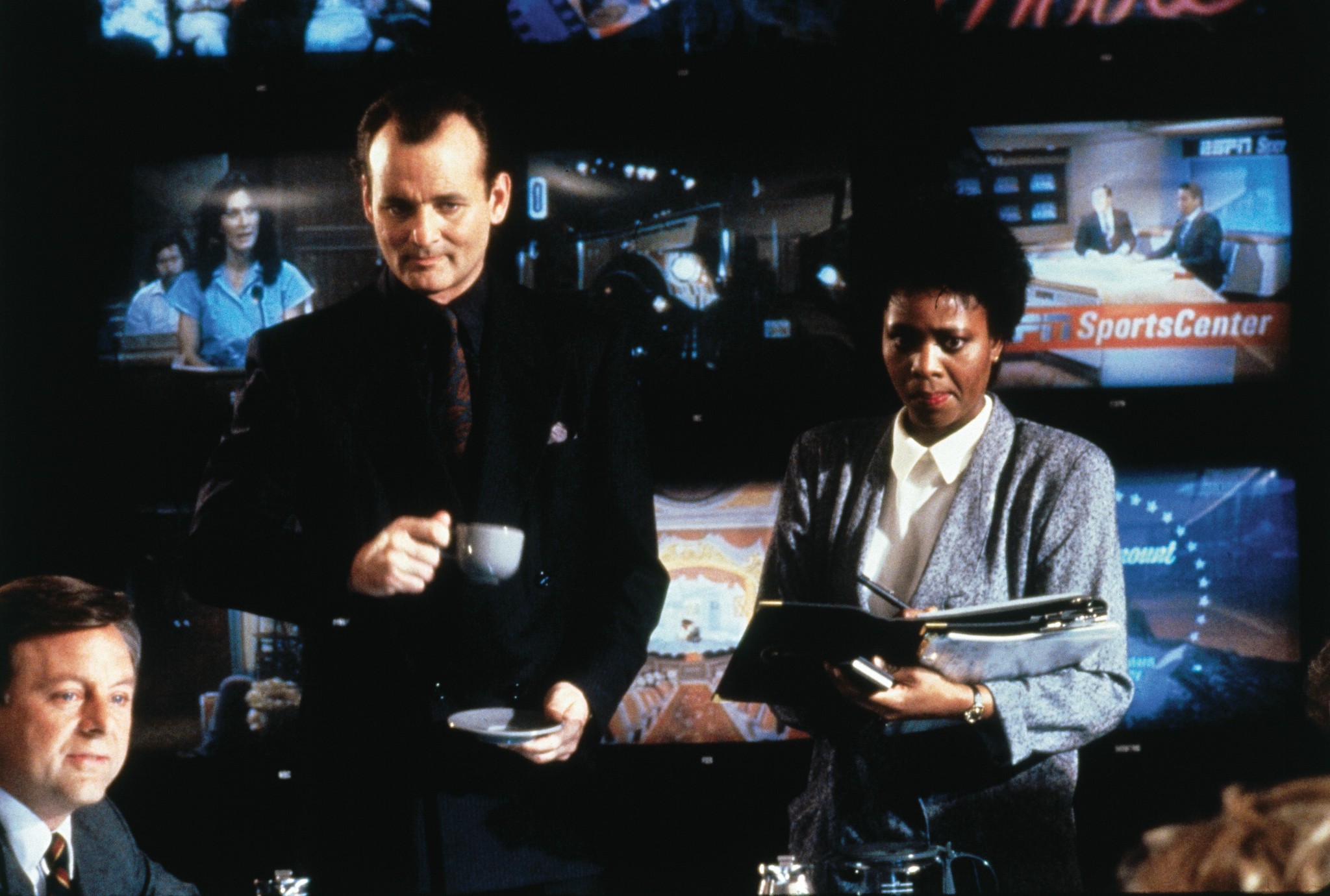 Bill Murray and Alfre Woodard in Scrooged (1988)