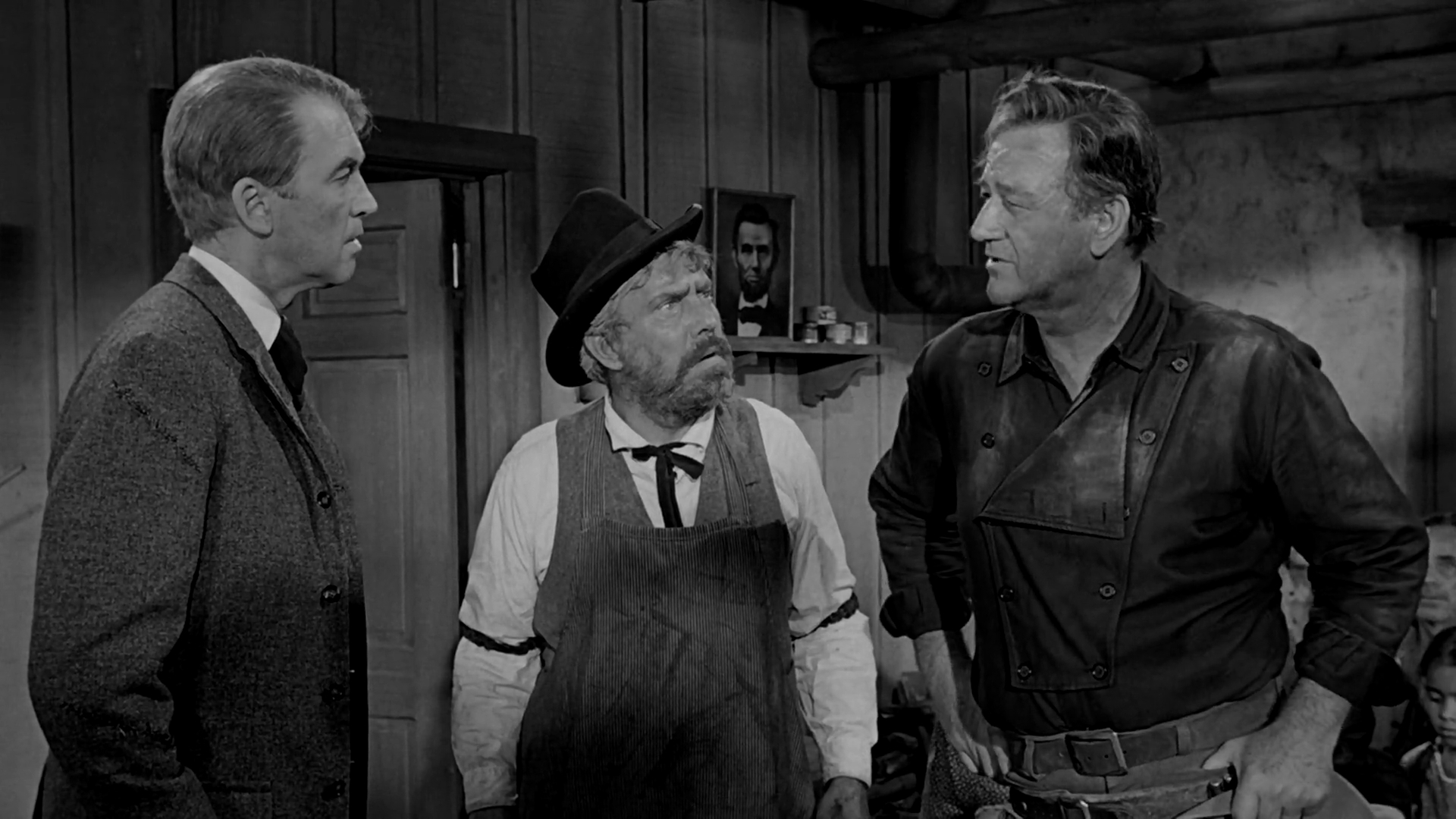 James Stewart, John Wayne, Edmond O'Brien, and Abraham Lincoln in The Man Who Shot Liberty Valance (1962)